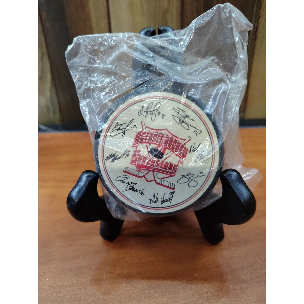 1997 NHL Detroit Hockey Superstars Autographed Puck -VINTAGE in original seal.
